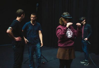 People wearing VR headsets