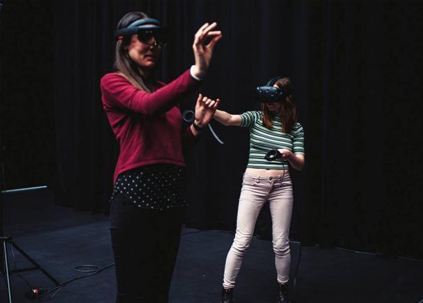 People wearing VR headsets